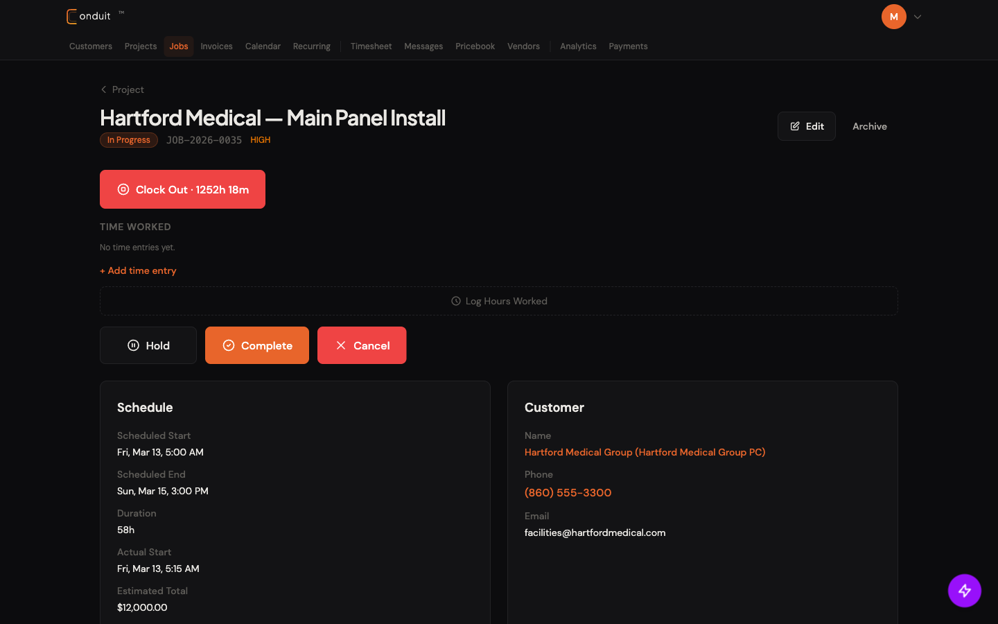 Job detail page for Hartford Medical Main Panel Install with status chip, Clock Out timer, Time Worked log, and status action buttons